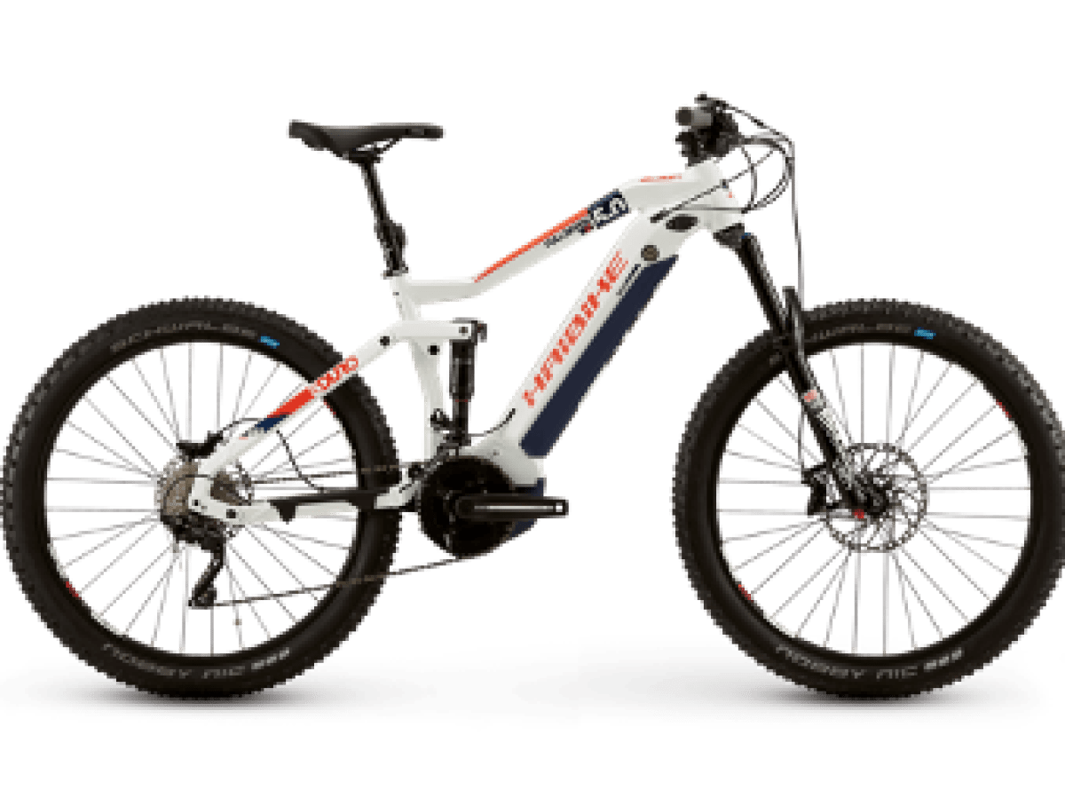 a bicycle is parked next to a motorcycle